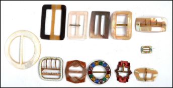 A collection of several vintage 20th century Art Deco ladies belt buckles of differing designs.