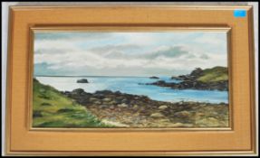 A framed oil on canvas painting of a country vista signed to the corner June Lethbridge. Measures