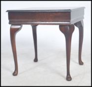 A vintage wooden cased games compendium having chessboard lid with chess, draughts, cards, dice