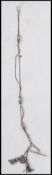 A 19th century silver Continental white metal ladies chatelaine measuring 40cm in length and