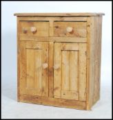 A late 19th century early 20th century scrubbed pine sideboard of small proportions having a