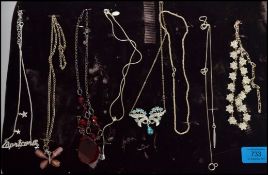 A collection of 20 vintage silver and costume ladies dress rings along with eight silver and other