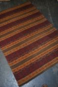 A vintage Uzbeki carpet rug being originally supplied from Artique of Tetbury for £200. The rug