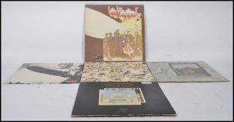 A group of five long play LP vinyl records by Led Zeppelin to include Led Zeppelin K40031,  Led