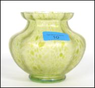 An early 20th century Art Nouveau iridescent glass vase, probably Loetz, of baluster shaped form