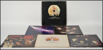 A group of six long play LP vinyl records by Queen, to include A Night At The Opera ( Blair ), A Day
