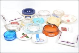 A collection of vintage 20th century advertising point of sale breweriana / tobacco smoking