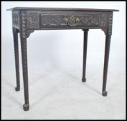 A believed 18th century Jacobean oak revival writing table desk being raised on well proportioned