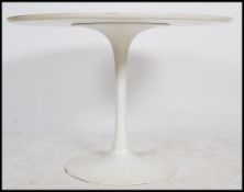 A retro 20th century large Eero Saarinen for Arkana white tulip table. The circular top over painted