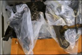 A collection of believed new and unused / nearly new architectural door handles some in wrapping and