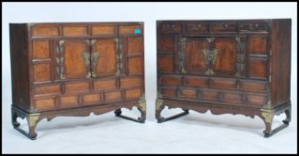 A pair of 20th century near  matching Korean / Chinese influenced asiatic box / marriage chests on