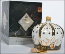 A vintage French Sempe Crown Of Napoleon Armagnac complete in original box with sleeve. The decanter