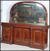 An impressive 19th century Victorian large mirror back mahogany sideboard having a plinth base