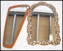A vintage 20th century retro teak frame less mirror of oblong form along with a mid 20th century