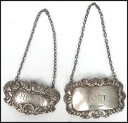 Silver hallmarked drinks bottle  labels. One label for port with Birmingham assay mark, makers