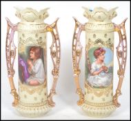 A pair of 19th century Victorian continental vases having gild twin handles with flared rims and