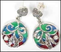 A pair of ladies conteporary decorative  silver and plique a jour earrings, each with coloured glass
