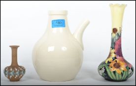 A mid century Walter Moorcroft bed pot with impressed and painted marks to base having a plain