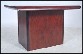 A good Danish 20th century coffee table being stamped to the base. Raised on twin panel supports