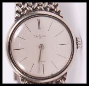 A mid century Valgine mid size silver 835marked wristwatch and strap. The dial marked for Valgine