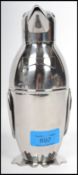 A contemporary 20th century  silver plated large novelty cocktail shaker in the form of a penguin.