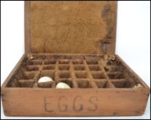 A vintage early to mid  20th century Egg transportation box, fitted with a hinged top opening to