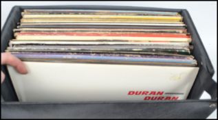 A collection of vinyl long play LP record albums by various artists to include ELO, Supertramp, Sky,