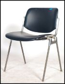 A 20th century DSC 106 stacking chair by Giancarlo Piretti for Castelli. Stamped to aluminum