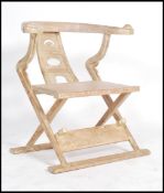 An unusual mid century Chinese stripped hard wood horseshoe throne chair, - armchair