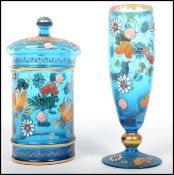 Two 19th century blue Bohemian glass pieces by Royo having floral sprays and chicken enamelled
