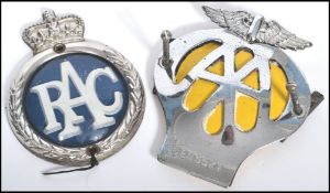 Two vintage 20th century motoring car badges one for RAC having white lettering on a blue ground