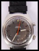 A vintage Omega Geneve chronometer Chronostop wristwath having a black dial with luminous hands