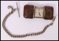 An early 20th Century Movado Chronometre Ermeto silver cased and faux leather vest or purse watch,