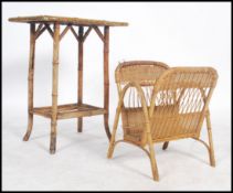 A Victorian aesthetic movement bamboo side table with a painted top and flower design to include a