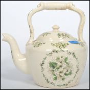 A large 20th century ceramic cream glaze cauldron kettle of Staffordshire origin with lid and a