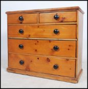 A 19th century Victorian pine chest of drawers having two short drawers over  three long drawers.