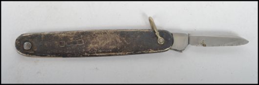 A vintage 20th century silver hallmarked pen knife having a fitted stainless steel blade, assay