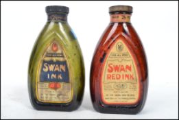 Two retro vintage 20th century Advertising point of sale Swan Ink glass bottles with labels to front