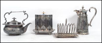 A collection of early 20th century silver plated items to include a tea caddy with hinged lid and