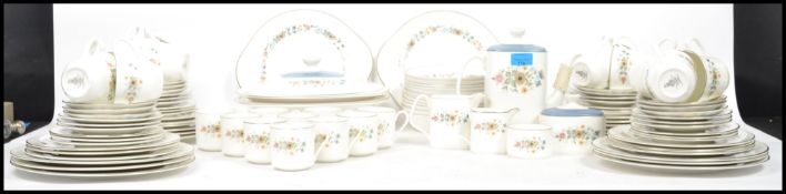 An extensive Fine Bone China dinner service by Royal Doulton in ' The Pastorale ' pattern over