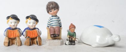 A group of  Goebbels ceramic figures to include a white basalt turtle, bird, a pair of children