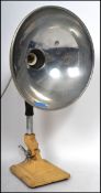 A 1950s cream pifco heat lamp being converted to a table lamp.
