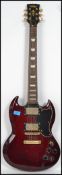 A vintage style six string fender style electric guitar ' Gibson SG ' reproduction guitar by