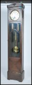 A good 1920's large Westminster chiming longcase clock with large silvered dial over glass window