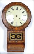 A large 19th century Victorian marquetry 8 day wall clock having marquetry inlay and a verre