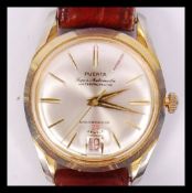 A good vintage mid century gentleman's Puerta wristwatch. The atch with baton numerals lower