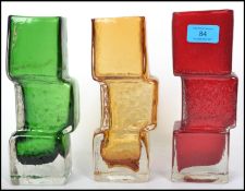 A group of three retro 20th century studio art glass Whitefriars style textured drunken bricklayer