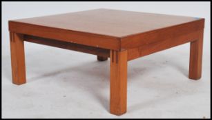 An air ministry coffee table having a square form