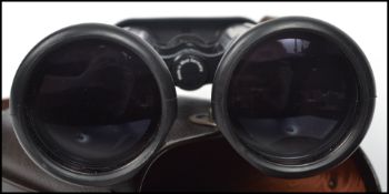 A good pair of original Carl Zeiss 8x56 B Dialyt binoculars complete in the leather case with rubber