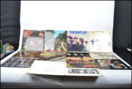 A collection of Beatles long play Lp vinyl records to include Sgt Peppers 12st with cut outs, Please